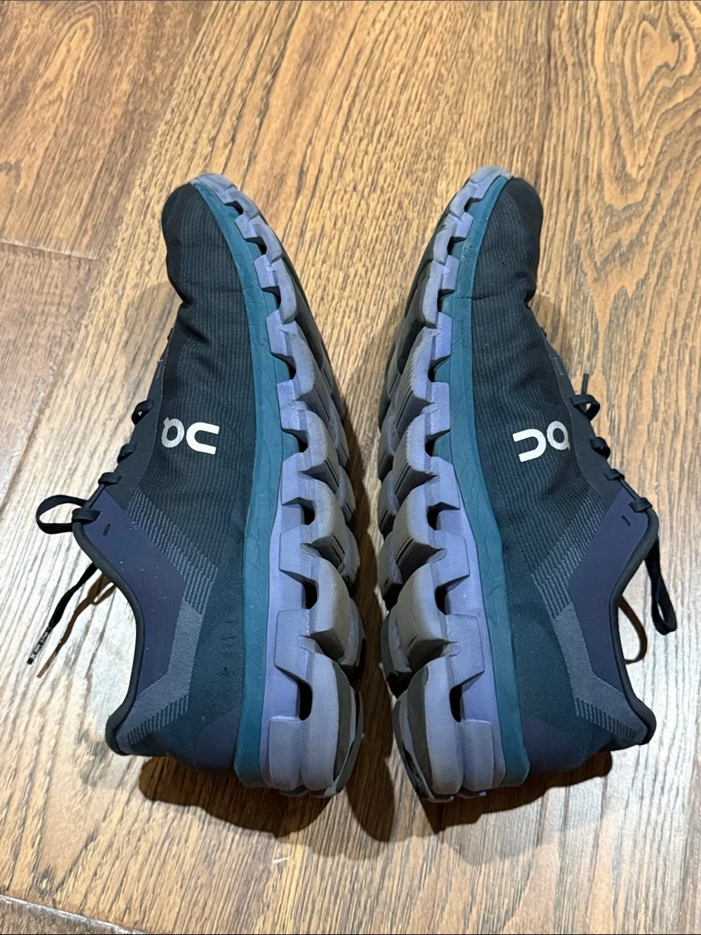 On Running Men's Athletic Shoes in Black and Blue